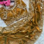 Zariah Luxe Cutwork Saree (Stitched Blouse)